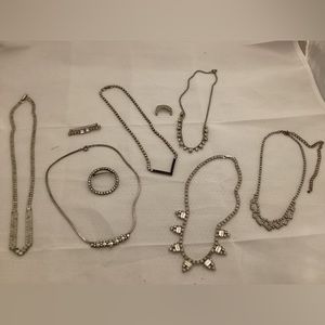 Shiny necklaces and brooches lot
